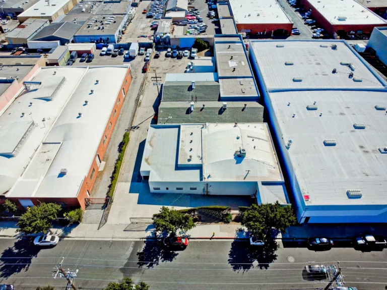 Aerial view of adjoining industrial buildings and loading areas